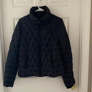 The North Face Black Women's Puffer Jacket.